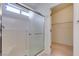 Clean bathroom shower stall with glass doors and tiled walls, adjacent to an open doorway leading to closet space at 2101 High Mesa Dr, Henderson, NV 89012