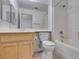 Clean bathroom with tiled shower and floors, and ample vanity space at 2101 High Mesa Dr, Henderson, NV 89012