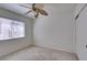 Neutral bedroom with carpet, ceiling fan, window with blinds, and closet at 2101 High Mesa Dr, Henderson, NV 89012