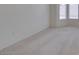 Neutral bedroom with carpet, baseboard trim and multiple windows at 2101 High Mesa Dr, Henderson, NV 89012
