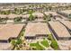 Neighborhood aerial view showcasing a collection of residences each with private backyard spaces and desert landscapes at 2509 Chateau Napoleon Dr, Henderson, NV 89044