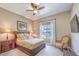 Bedroom boasts a ceiling fan, and a large window at 2509 Chateau Napoleon Dr, Henderson, NV 89044