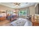 Spacious main bedroom boasts hardwood floors, recessed lights, and large window at 2509 Chateau Napoleon Dr, Henderson, NV 89044