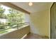Outdoor balcony view showcasing the community landscaping and common areas at 2633 S Durango Dr # 202, Las Vegas, NV 89117