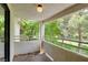 Enclosed outdoor balcony overlooking mature trees and landscaping at 2633 S Durango Dr # 202, Las Vegas, NV 89117