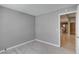 Bedroom with wood flooring and a doorway view to the kitchen at 2633 S Durango Dr # 202, Las Vegas, NV 89117