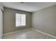 Bedroom with wood flooring, closet, and large window allowing lots of natural light at 2633 S Durango Dr # 202, Las Vegas, NV 89117