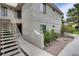 Exterior stairs of a condo building with desert landscaping and stucco walls at 2633 S Durango Dr # 202, Las Vegas, NV 89117