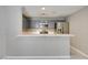 Updated kitchen featuring gray cabinets, stainless steel appliances and quartz countertops at 2633 S Durango Dr # 202, Las Vegas, NV 89117