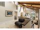 Bright hallway with a skylight, high ceilings, stylish railings, and a comfortable chair at 2845 Queens Courtyard Dr, Las Vegas, NV 89109