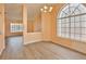 Light-filled dining area with new floors and large windows at 2865 Destino Ln, Henderson, NV 89074