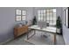 A bright home office space is decorated with modern furniture and stylish artwork at 2865 Destino Ln, Henderson, NV 89074