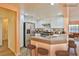 Eat-in kitchen features stainless steel appliances and cozy breakfast bar at 2865 Destino Ln, Henderson, NV 89074