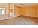 Spacious living room with new flooring, neutral paint, and a seamless flow into other areas at 2865 Destino Ln, Henderson, NV 89074