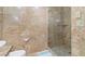 Updated bathroom featuring a glass shower, and neutral tile at 30 Strada Di Villaggio # 118, Henderson, NV 89011