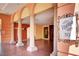 Elegant building entrance featuring ornate columns and decorative signage at 30 Strada Di Villaggio # 118, Henderson, NV 89011