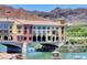 Unique building on bridge over water, with colorful facade and scenic views at 30 Strada Di Villaggio # 118, Henderson, NV 89011