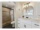 Elegant bathroom boasts a glass shower, modern vanity, and chic fixtures for a luxurious experience at 307 Balsa St, Henderson, NV 89002