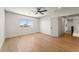 Bright bedroom features a ceiling fan, large window, and spacious layout, offering a comfortable retreat at 307 Balsa St, Henderson, NV 89002