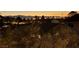Beautiful city view from a residential neighborhood in Las Vegas, Nevada at night with orange and purple sky at 307 Balsa St, Henderson, NV 89002