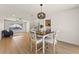 Open-concept room with modern light fixture, and view of living room and staircase at 307 Balsa St, Henderson, NV 89002