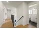 Bright hallway features wood floors, white walls, and an open railing at 307 Balsa St, Henderson, NV 89002