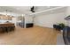 Open floor plan with updated kitchen, fireplace, and furniture in living area at 307 Balsa St, Henderson, NV 89002