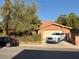 Charming single-story home with stone accents, a tile roof, and a well-manicured front yard at 3167 El Cedro Cir, Las Vegas, NV 89121