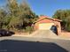 Charming single-Gathering home with a well-maintained front yard, a two car garage, and beautiful stone facade at 3167 El Cedro Cir, Las Vegas, NV 89121