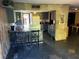 Eat-in kitchen features stone finishes and backyard access at 3167 El Cedro Cir, Las Vegas, NV 89121