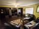 Spacious living room with large built-in shelving and cabinetry, providing ample storage and entertainment space at 3167 El Cedro Cir, Las Vegas, NV 89121