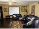 Inviting living room with comfortable seating and a large window, creating a bright and welcoming atmosphere at 3167 El Cedro Cir, Las Vegas, NV 89121