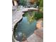 Backyard in-ground pool with stone surround and patio, great for entertaining at 3167 El Cedro Cir, Las Vegas, NV 89121