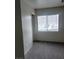 Bedroom with carpet and window at 3237 Perching Bird Ln, North Las Vegas, NV 89084