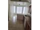 Kitchen featuring tile floors, stainless steel sink, and ample counter space at 3237 Perching Bird Ln, North Las Vegas, NV 89084