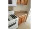 Cozy kitchen featuring a gas range, microwave, and ample counter space at 3237 Perching Bird Ln, North Las Vegas, NV 89084