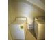 Small laundry room featuring a washing machine and dryer, with bright, neutral walls at 3237 Perching Bird Ln, North Las Vegas, NV 89084