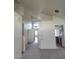 The spacious living room is bright and features neutral paint, carpet, and high ceilings at 3237 Perching Bird Ln, North Las Vegas, NV 89084