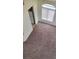 Carpeted loft area with natural light at 3237 Perching Bird Ln, North Las Vegas, NV 89084