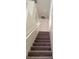Stairway featuring worn gray carpet at 3237 Perching Bird Ln, North Las Vegas, NV 89084
