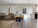 Cozy dining area with a table and chairs, open to living area at 3359 Commendation Dr, Las Vegas, NV 89117