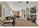 Open living area with a view into the kitchen and lots of natural light at 3359 Commendation Dr, Las Vegas, NV 89117