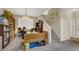 View of living area featuring stairs to the second level and desk at 3359 Commendation Dr, Las Vegas, NV 89117