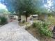 Backyard featuring flagstone, mature landscaping and a covered patio with BBQ at 3633 Monte Verde St, Las Vegas, NV 89121