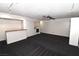 Bonus room featuring carpeting, track lighting, a ceiling fan and a wet bar at 3633 Monte Verde St, Las Vegas, NV 89121