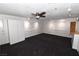 Bonus room featuring carpeting, a ceiling fan and a wet bar at 3633 Monte Verde St, Las Vegas, NV 89121