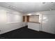 Bonus room featuring carpeting, track lighting, and a wet bar with built in cabinets at 3633 Monte Verde St, Las Vegas, NV 89121