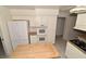 Well-equipped kitchen featuring white appliances, ample cabinetry, and a convenient island for prep work at 3633 Monte Verde St, Las Vegas, NV 89121