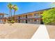 Apartment building featuring a central courtyard with mature palm trees and walkways at 3720 Royal Crest St # 6, Las Vegas, NV 89119