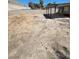 Large private backyard featuring a barren landscape at 3755 Chutney St, Las Vegas, NV 89121